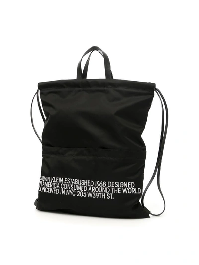 Shop Calvin Klein Drawstring Backpack In Multicolor (black)