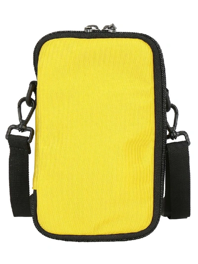 Shop Balenciaga Explorer Cross Body Pouch In Yellow