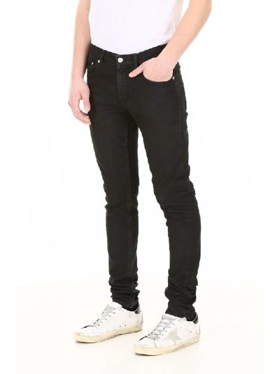 Shop Alexander Mcqueen Jeans With Logo Embroidery In Grey Washed (black)