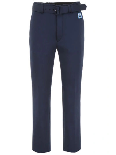 Shop Prada Trousers With Logo Patch In Navy (blue)