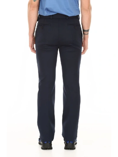 Shop Prada Trousers With Logo Patch In Navy (blue)