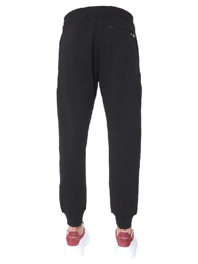 Shop Alexander Mcqueen Jogging Pants With Skull Patches In Nero