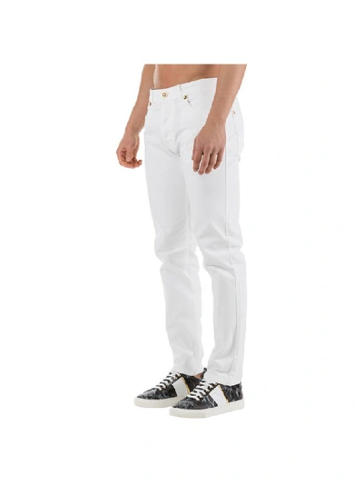 Shop Versace Elvis Jeans In Bianco