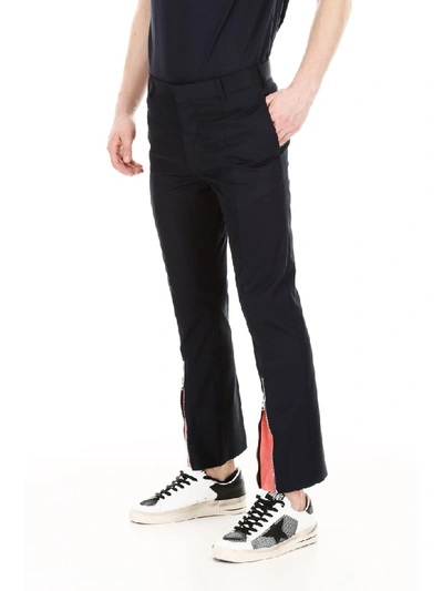 Shop Alexander Mcqueen Zipped Trousers In Dark Navy (blue)