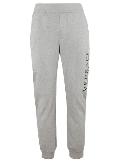 Shop Versace Logo Print Track Pants In Grey/black