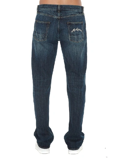 Shop Alexander Mcqueen Turn Up Jeans In Blue