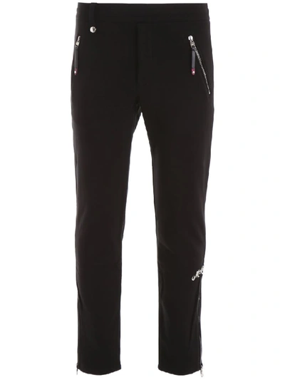 Shop Alexander Mcqueen Joggers With Embroidered Logo In Black (black)