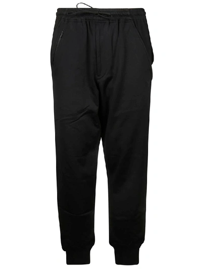 Shop Y-3 Wide Leg Track Pants In Black