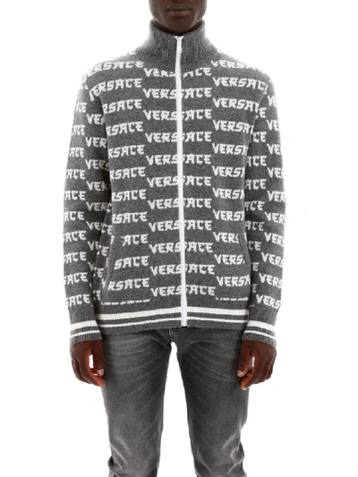 Shop Versace Monogram Zipped Cardigan In Grigio Melange Bianco (grey)