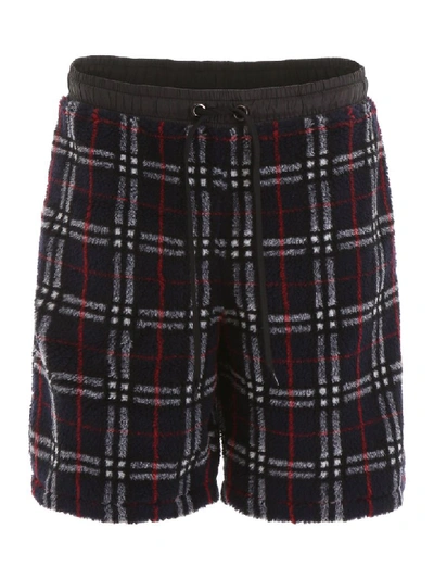 Shop Burberry Faux Shearling Keaton Bermuda Shorts In Navy Ip Check (blue)