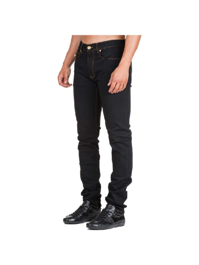 Shop Versace Logo Jeans In Blu