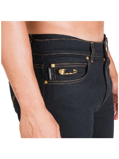 Shop Versace Logo Jeans In Blu