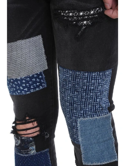 Shop Amiri Jeans In Black Denim