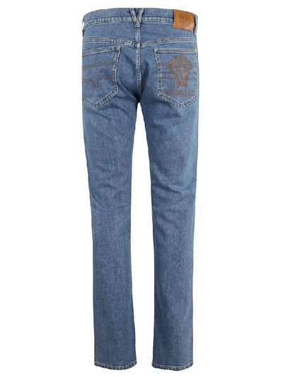 Shop Versace Straight Leg Jeans In Blue