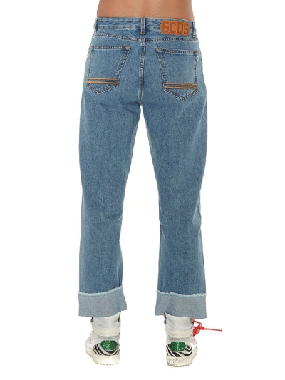 Shop Gcds Wide Fit Logo Jeans In Denim