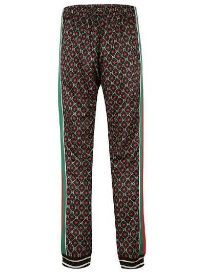 Shop Gucci All-over Logo Printed Track Pants In Black