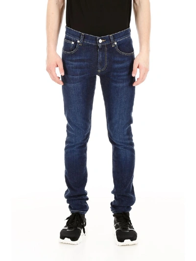 Shop Alexander Mcqueen Jeans With Logo Embroidery In Blu Washed (blue)