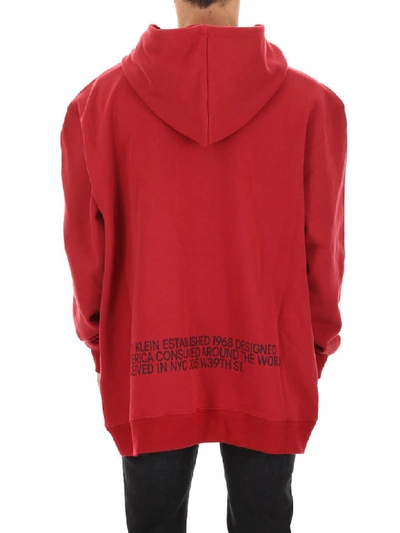 Shop Calvin Klein Logo Hoodie In Rosso Scuro (red)