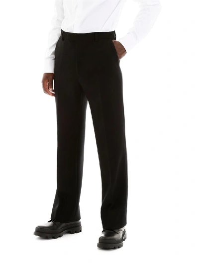 Shop Prada Woolcloth Trousers In Nero (black)
