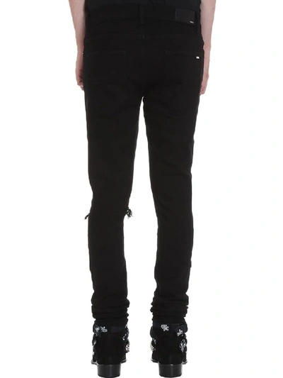 Shop Amiri Jeans In Black Denim