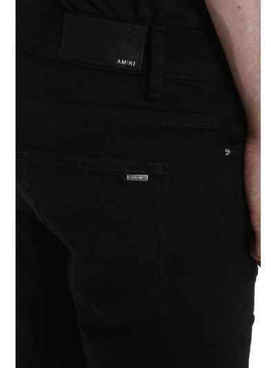 Shop Amiri Jeans In Black Denim