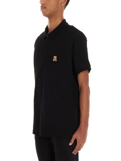 Shop Moschino Polo In Black