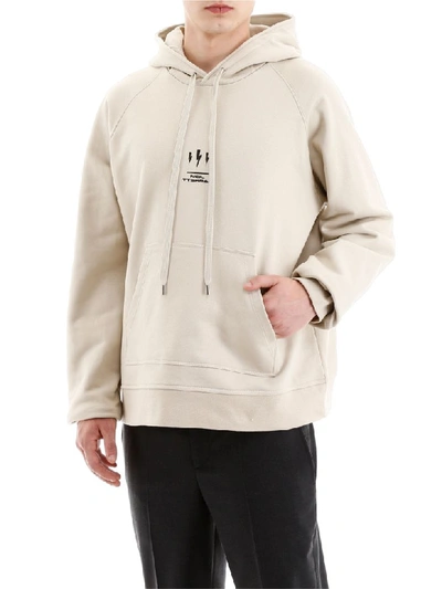 Shop Neil Barrett Oversized Hoodie With Thunder Print In Bone Black (beige)