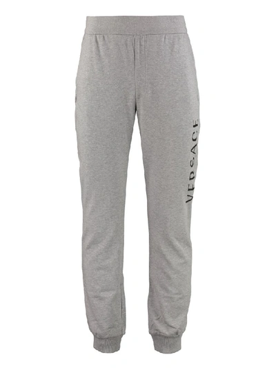 Shop Versace Logo Detail Cotton Track-pants In Grey