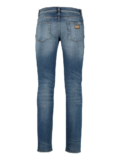 Shop Dolce & Gabbana Ripped Skinny Jeans In Denim