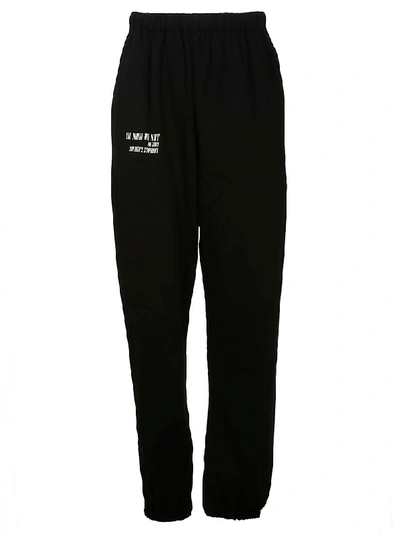 Shop Ih Nom Uh Nit Logo Print Track Pants In Black