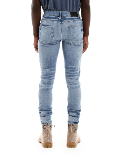 Shop Amiri Thrasher Plus Jeans In Medium Crafted Indigo (blue)