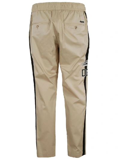 Shop Dolce & Gabbana Trousers In Beige