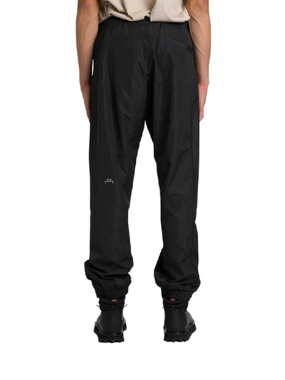 Shop A-cold-wall* Nylon Trousers In Nero
