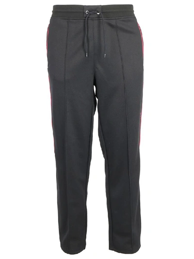 Shop Givenchy Track Pants In Black Red