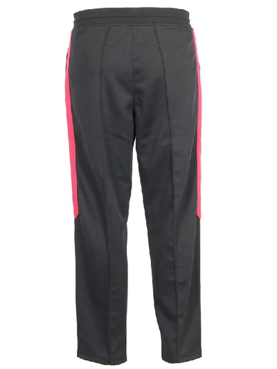 Shop Givenchy Track Pants In Black Red