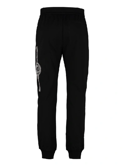 Shop Versace Logo Detail Cotton Track-pants In Black