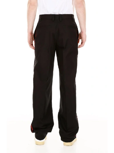 Shop Burberry Trousers With Quotes In Black (black)