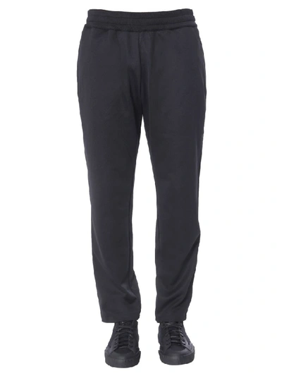 Shop Moschino Jogging Pants In Nero