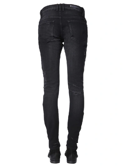 Shop Balmain Super Destroy Jeans In Nero