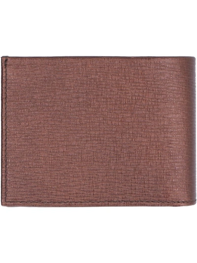 Shop Ferragamo Leather Flap-over Wallet In Bronze