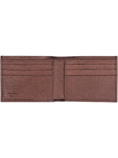 Shop Ferragamo Leather Flap-over Wallet In Bronze