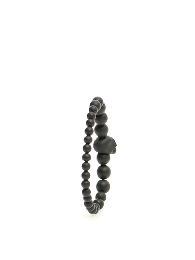 Shop Alexander Mcqueen Skull Bracelet In Black (black)