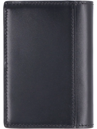 Shop Burberry Leather Flap-over Card Holder In Black