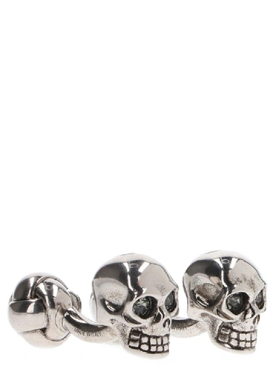 Shop Alexander Mcqueen Twin Skulls Cuffs In Silver