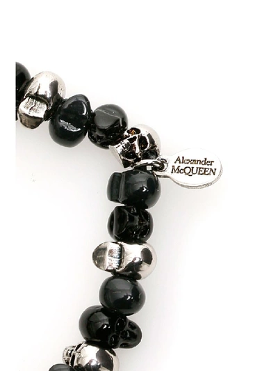 Shop Alexander Mcqueen Bicolor Skull Bracelet In Anthracite Blk (silver)