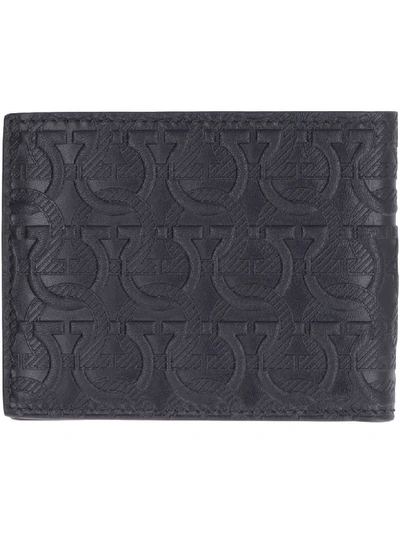Shop Ferragamo All-over Logo Print Flap-over Wallet In Black