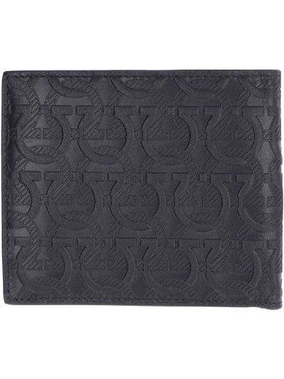 Shop Ferragamo All-over Logo Print Flap-over Wallet In Black