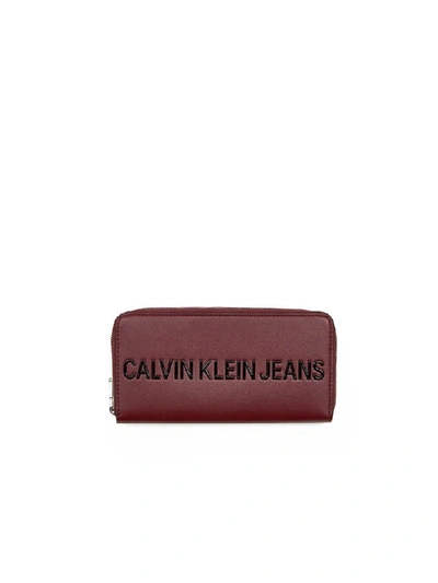 Shop Calvin Klein Burgundy Zip Wallet In Bordeaux (red)