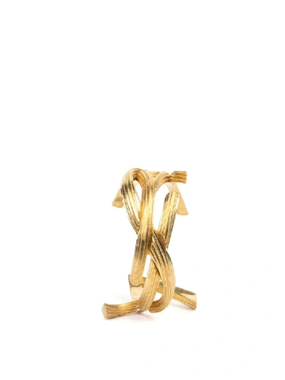 Shop Saint Laurent Rigid Metal Monogram Shaped Bracelet In Gold