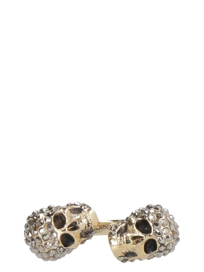 Shop Alexander Mcqueen Twin Skull Brass Ring In Gold